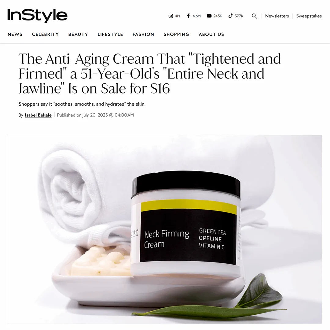 YEOUTH neck cream for wrinkles jar placed on a white spa towel beside a green tea, photographed on a clean white background