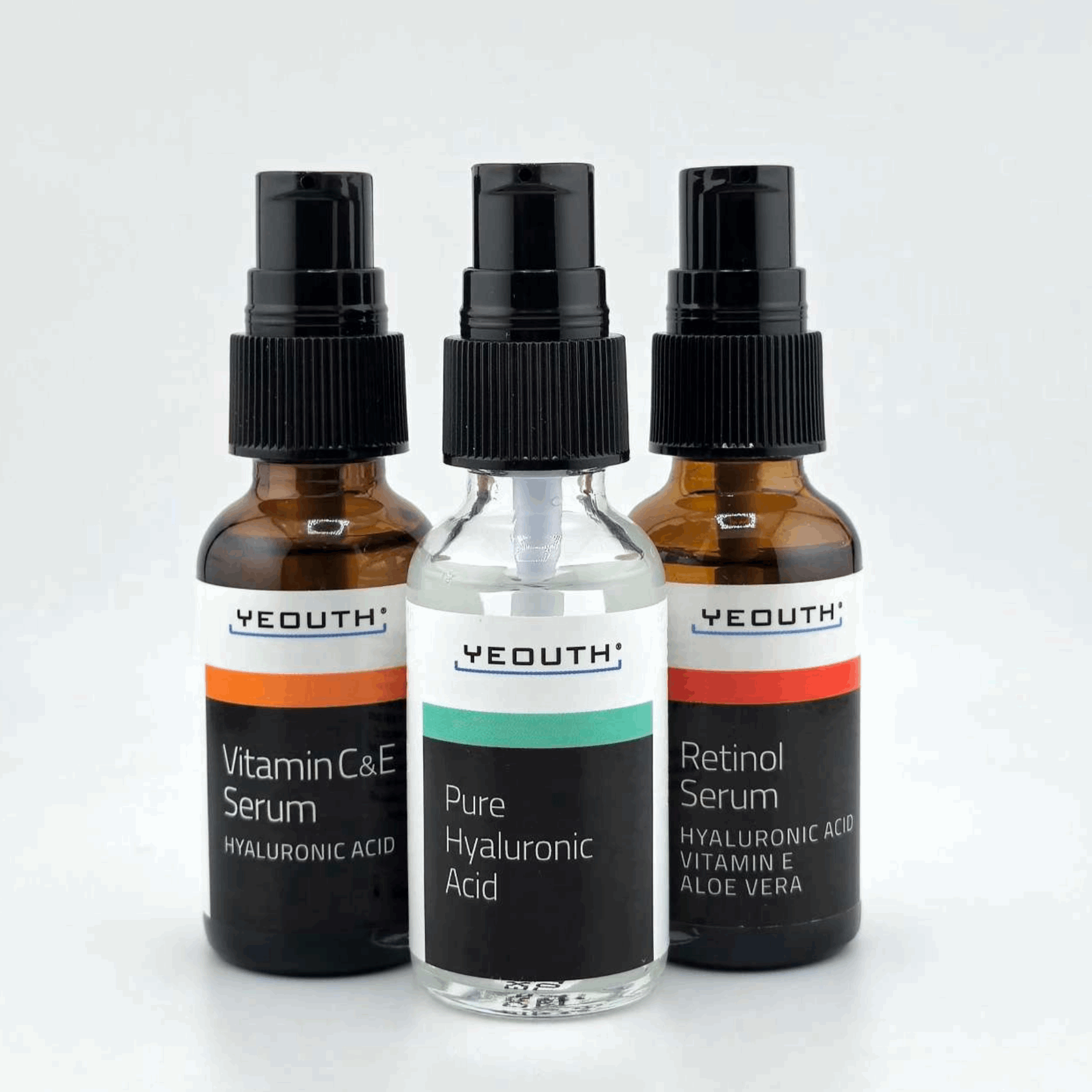 Three YEOUTH face serum set displayed: Vitamin C & E Serum, Pure Hyaluronic Acid, and Retinol Serum and Vitamin E.