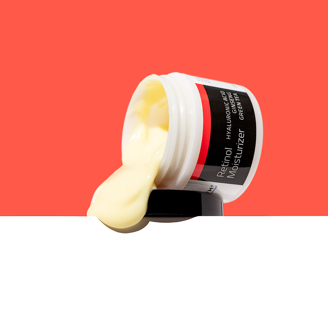 YEOUTH Retinol Moisturizer with cream spilling out. Highlights key ingredients Hyaluronic Acid, Green Tea, and Retinol.